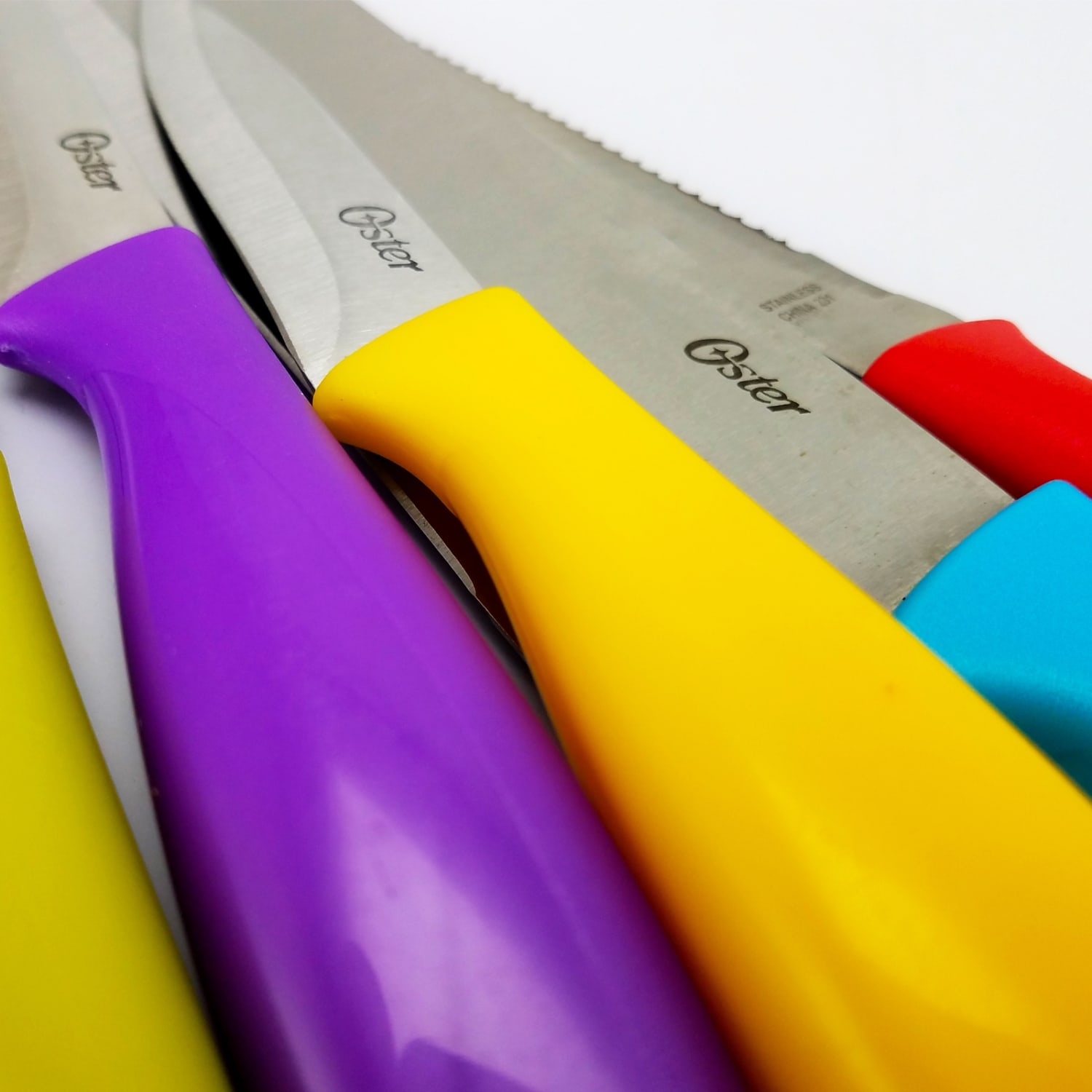 Oster Stainless-Steel 14-Piece Cutlery Set, Assorted Colors - Image 4
